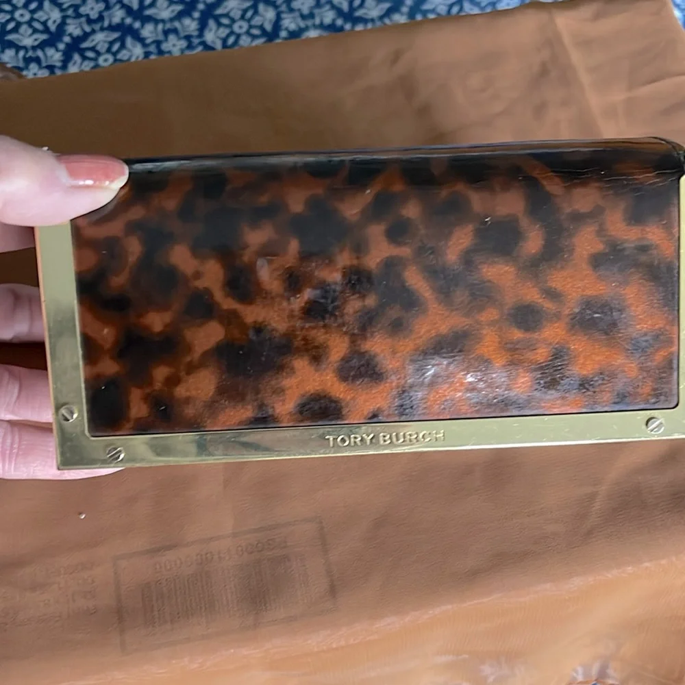 Authentic Tory Burch glass case. Animal print. Magnetic closure. Gold trim . EUC - Picture 4 of 7